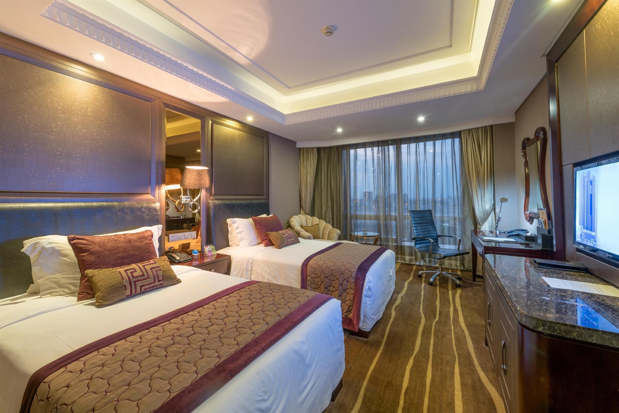 Care Feeling Grand Hotel - Deyang - Bedroom