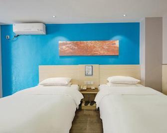 City Home Hotel - Bozhou - Schlafzimmer