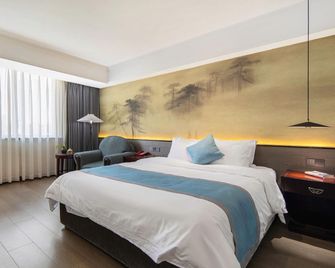 Hongyuan Hotel - Leshan - Bedroom