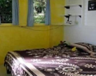 El Momo Cottages - Windward Side - Bedroom