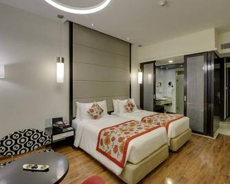 E Hotel - Madras - Slaapkamer