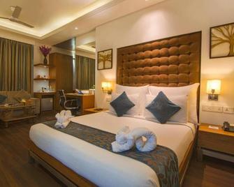 Hotel Riverview - אחמדאבאד - חדר שינה