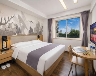 Thank Inn Hotel Sichuan Suining Suizhou Nan Road - Suining - Slaapkamer