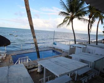 Apartment 02 side / sea view, ground floor, 1 suite and 1 bedroom. Solar Maradentro - Paulista - Balcon