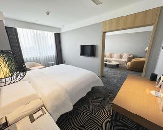 International Conference Exhibition Center - Changchun - Soveværelse