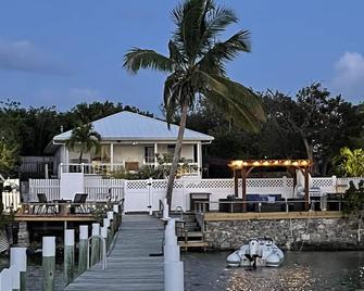 Waterfront Beach Bungalow with 150 Foot Dock on Guana Cay and Waterside Pergola - Hope Town