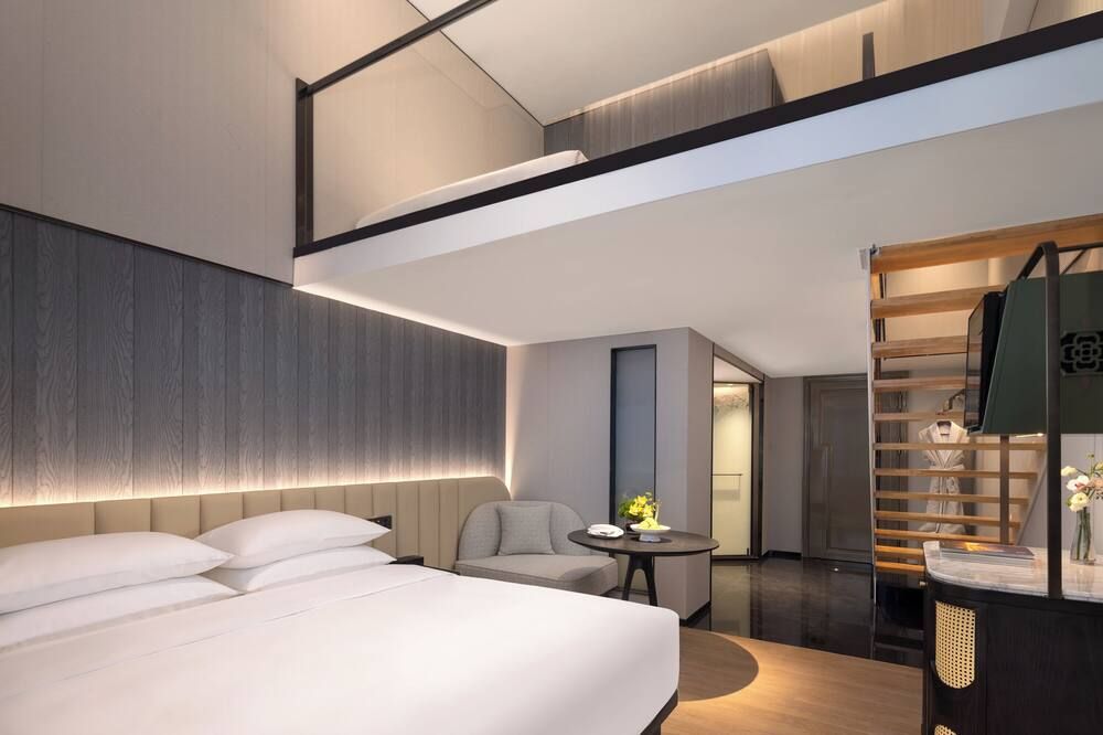 كانمينج كاسن هوتل - كونمينغ - غرفة نوم