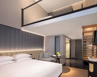 Kunming Kasion Hotel - Kunming - Habitación