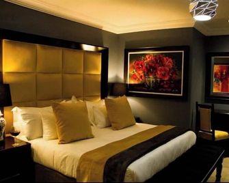 Sasavona Boutique Hotel - Polokwane - Ložnice