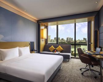Novotel Haikou Xinbudao - Haikou - Bedroom