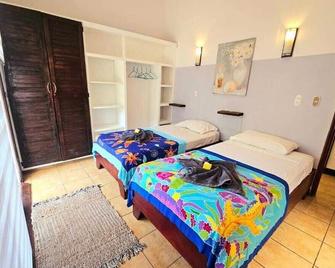 Cozy and easy-access cabin - Ojochal - Habitación