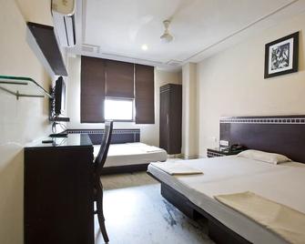 Smyle Inn - New Delhi - Bedroom