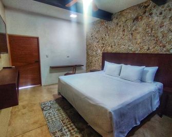 Apartamentos Casa Esquina - Mérida - Habitación