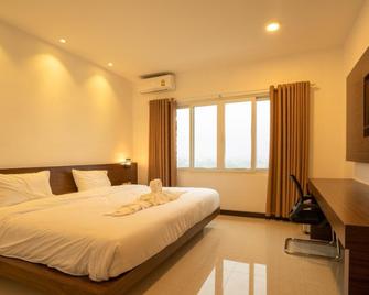 Intouch Riverside Hotel - Pakse - Bedroom
