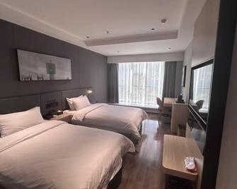 Thank Inn Chain Hotel Shanxi Lvliang Lis - Lüliang - Bedroom
