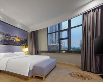 Duoya Hotel (Xiangyang Walmart Minfa Plaza Branch) - Xiangyang - Camera da letto