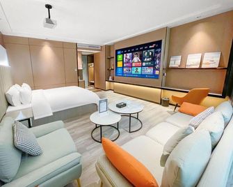 Jieyang Victoria Holiday Business Hotel - Цзеян - Спальня