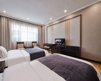 Botai Hotel - Xi'an - Bedroom