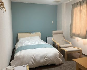 Business Hotel Yukuhashi - Yukuhashi - Schlafzimmer