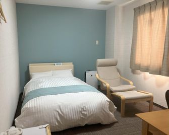 Business Hotel Yukuhashi - Yukuhashi - Ložnice