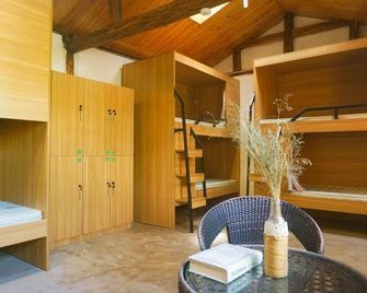 Dengba Snow Mountain International Youth Inn - Lệ Giang - Phòng ngủ