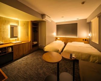 Super Hotel Hachinohe natural Hot Springs - Hachinohe - Спальня