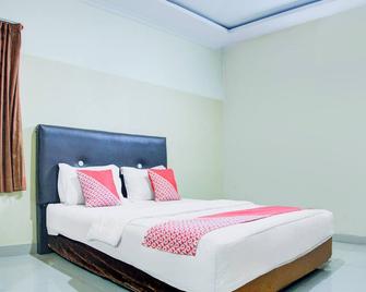 Maleo Residence Palembang I By OYO Rooms - Palembang - Schlafzimmer