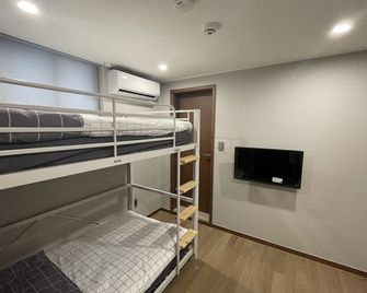 Hao Guesthouse in Hongdae - Seul - Yatak Odası