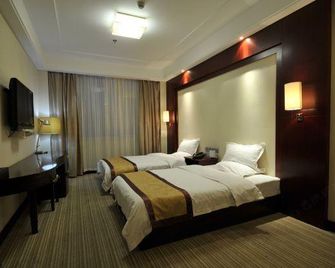 Huitong Business Hotel - Yangquan - Schlafzimmer