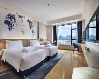 Kyriad Marvelous Hotel Hezhou Wanda Plaza - Hezhou - Habitación