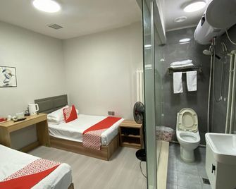 Jingxi Yuetian Fashion Hotel - هاربين - غرفة نوم