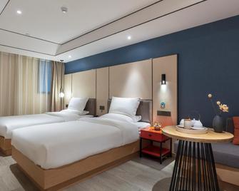 Vyluk Hotel Chongqing Guanyinqiao Light Rail Station - Chongqing - Bedroom