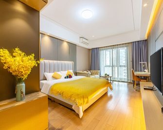 Manhattan Langde Apartment - Canton - Habitació