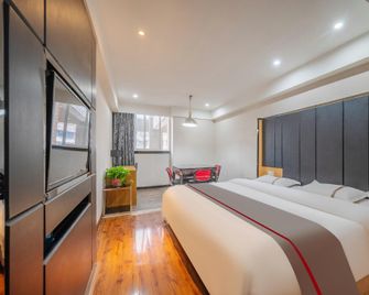 Chengke Hotel Chongqing Wanzhou District Gaosuntang New Century - Dazhou - Bedroom