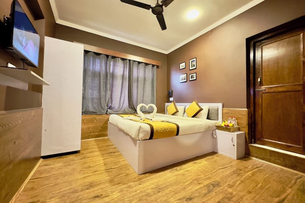 هوتل جافسون أكوموداتس - سريناجار - غرفة نوم