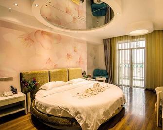 Bole Hotel - Yiyang - Bedroom
