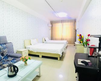 Carstar Quik Hotel - Zhengzhou - Bedroom