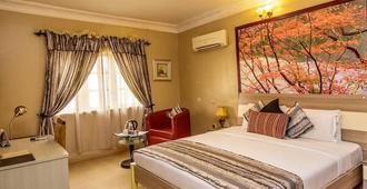 Apartment Royale Hotel & Suite - Lagos - Slaapkamer