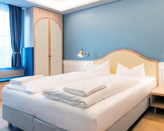 Seetelhotel Ostseeresidenz Heringsdorf - הרינגסדורף - חדר שינה