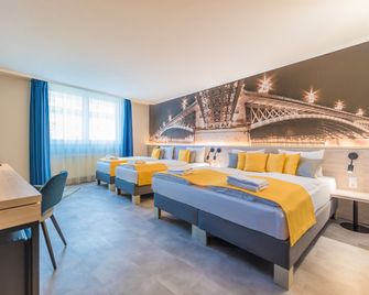 إمبولسو فاشون هوتل - بودابست - غرفة نوم