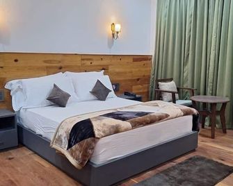 Pines Dirang Homestay - Dirāng
