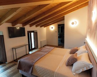 4 Elementi Relais B&B Lonato del Garda - Castellaro Lagusello - Schlafzimmer