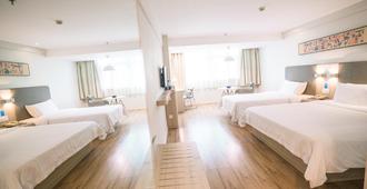 Hanting Hotel Nanchang Bayi Square Fuzhou Road - Nanchang - Schlafzimmer