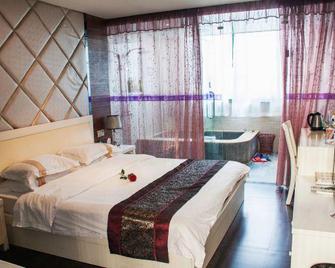 Tangquan Hotel - נאנז'ינג - חדר שינה