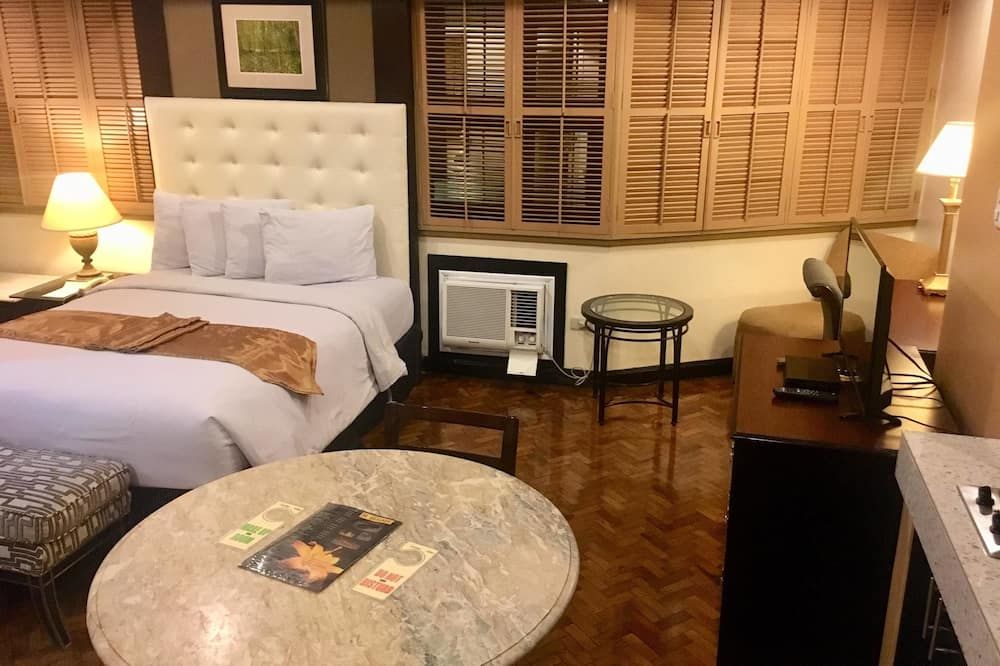 Lourdes Family Suites Makati powered by Cocotel - מנילה - חדר שינה