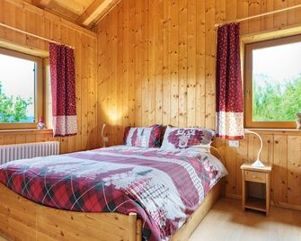 Baita Angomà sopra Levico a 1150m - Levico Terme - Bedroom