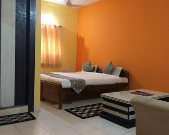 هوتل أرام إن - رانتشي - غرفة نوم