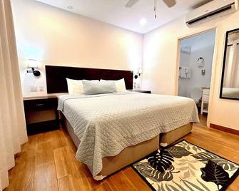 La Casa de Paz Hotel - San Pedro Town - Habitación