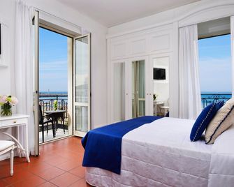 Hotel President - ויארג'ו - חדר שינה