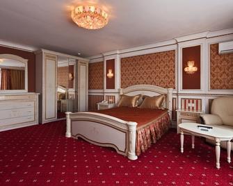 Hotel Moskvich - Moskau - Schlafzimmer